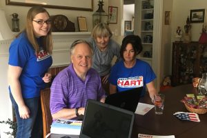 Hart's campaign team (with his wife behind him to the right).